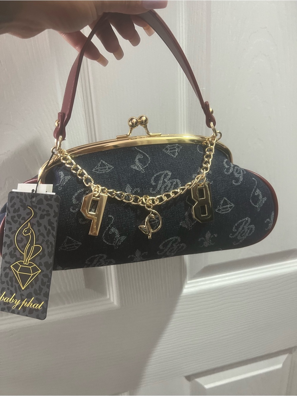 Baby Phat Black Monogram Kiss-Lock Clutch with Gold Chain and Burgundy Trim